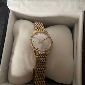 Gold Gucci Timeless Watch